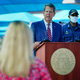 Georgia Governor Brian Kemp speaks as U.S. Surgeon General Jerome Adams looks on during a press conference announcing expanded statewide COVID testing on August 10, 2020 in Atlanta, Georgia. .